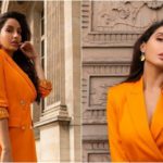 Nora Fatehi wearing orange Versace Blazer with Sequinned Pants – latest photoshoot – featured – Major Mag
